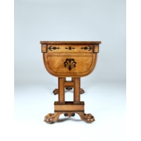 A Regency Period Games Table in Solid and Veneered Lacewood Inlaid with Ebony to a Design by George Smith