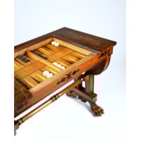 A Regency Period Games Table in Solid and Veneered Lacewood Inlaid with Ebony to a Design by George Smith