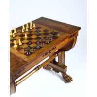 A Regency Period Games Table in Solid and Veneered Lacewood Inlaid with Ebony to a Design by George Smith