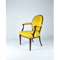 A Pair of George III Period Carved Mahogany Open Armchairs Attributed to Thomas Chippendale