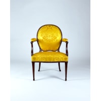 A Pair of George III Period Carved Mahogany Open Armchairs Attributed to Thomas Chippendale