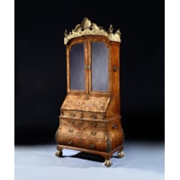 A George I Period Burr Walnut Giltwood and Brass Mounted Bombe Bureau Cabinet