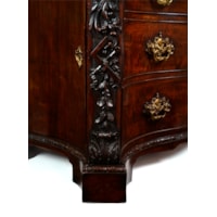 A PAIR OF GEORGE II PERIOD SERPENTINE FRONTED MAHOGANY COMMODES ATTRIBUTED TO THE WORKSHOP OF WILLIAM VILE OR WILLIAM HALLETT THE CARVING POSSIBLY BY JOHN BOSON