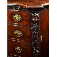 A PAIR OF GEORGE II PERIOD SERPENTINE FRONTED MAHOGANY COMMODES ATTRIBUTED TO THE WORKSHOP OF WILLIAM VILE OR WILLIAM HALLETT THE CARVING POSSIBLY BY JOHN BOSON