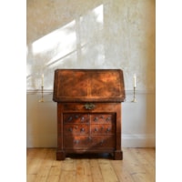 A GEORGE I PERIOD BURR WALNUT ARCHITECTS DESK