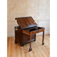 A GEORGE I PERIOD BURR WALNUT ARCHITECTS DESK