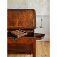 A GEORGE I PERIOD BURR WALNUT ARCHITECTS DESK