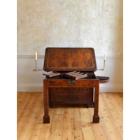 A GEORGE I PERIOD BURR WALNUT ARCHITECTS DESK