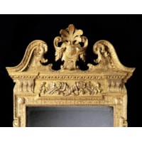 A George II Carved Giltwood Mirror