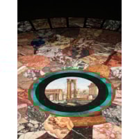 A Regency Period Gilt and Ebonised Centre Table with a specimen marble and micro-mosaic top