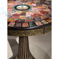 A Regency Period Gilt and Ebonised Centre Table with a specimen marble and micro-mosaic top