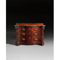 A PAIR OF GEORGE II PERIOD SERPENTINE FRONTED MAHOGANY COMMODES ATTRIBUTED TO THE WORKSHOP OF WILLIAM VILE OR WILLIAM HALLETT THE CARVING POSSIBLY BY JOHN BOSON