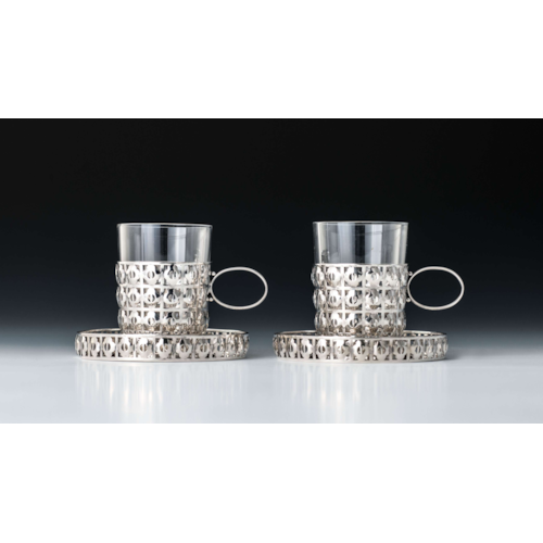 TWO PAIRS OF CUPS AND SAUCERS