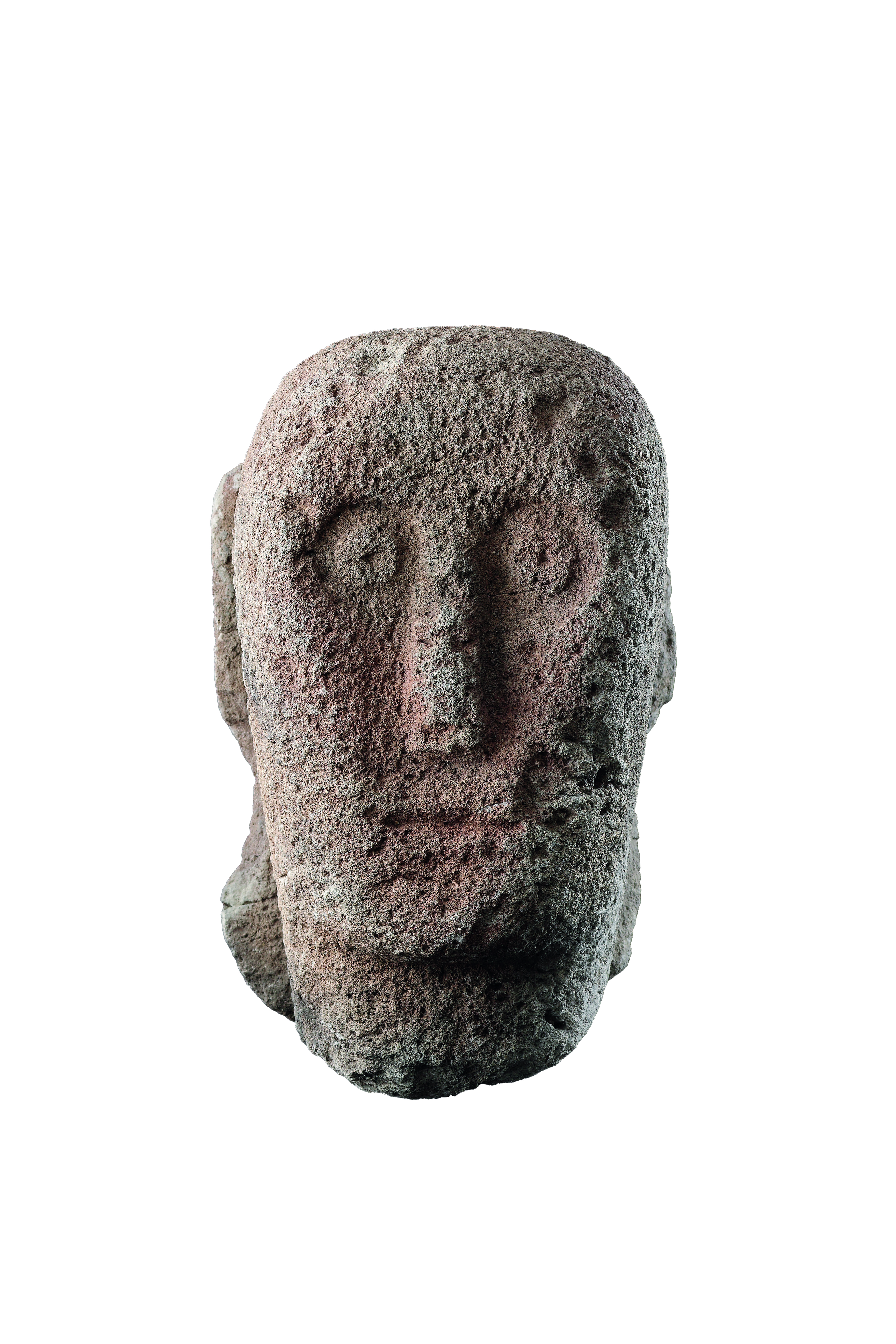 A Celtic Stone Head with ‘Staring’ Eyes, Long Nose and Slit Mouth