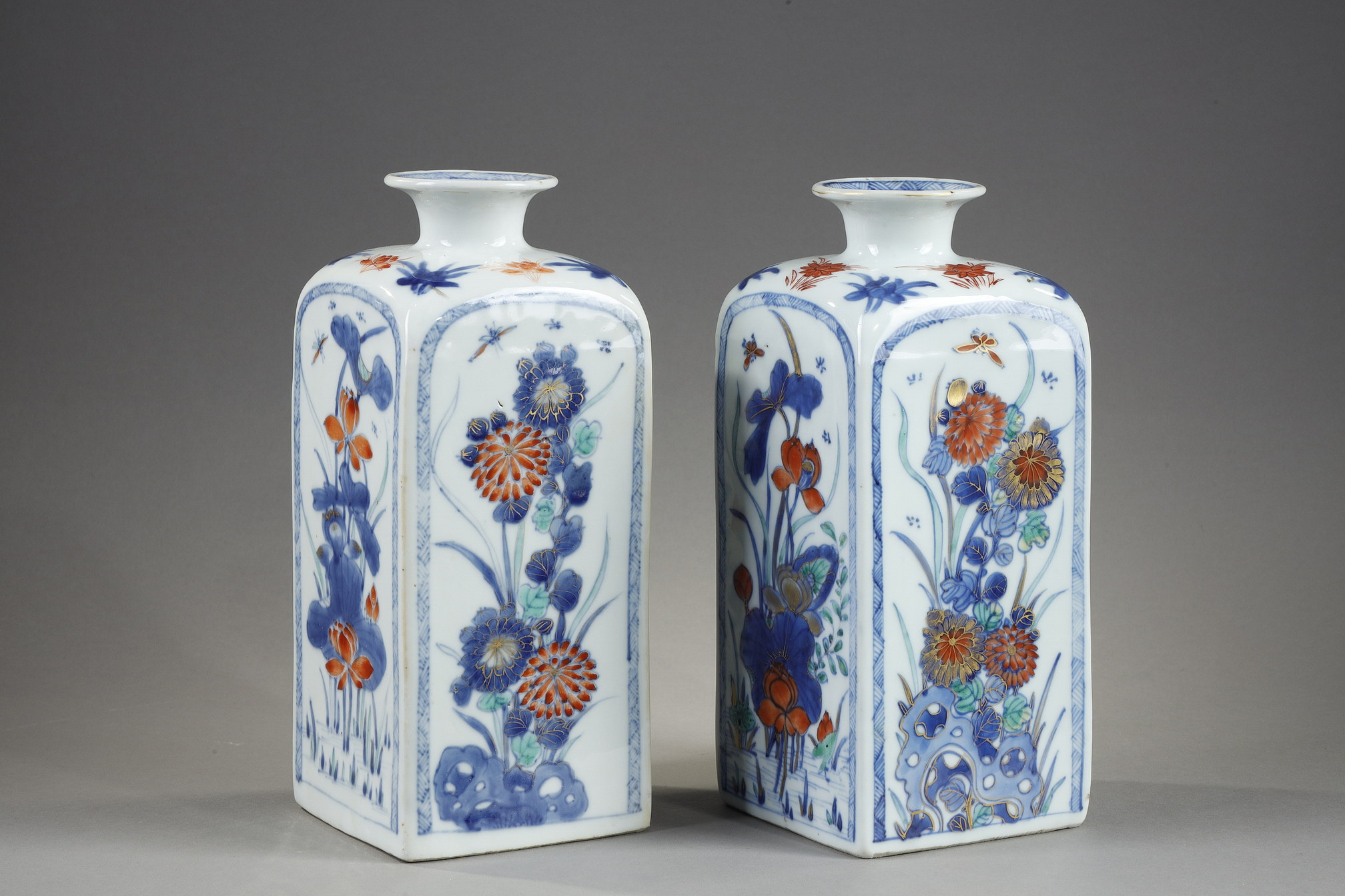 Pair of quadrangular vases decorated in blue underglaze and polychrome enamels
of flowers and foliage - China Kangxi period circa 1700/1720
