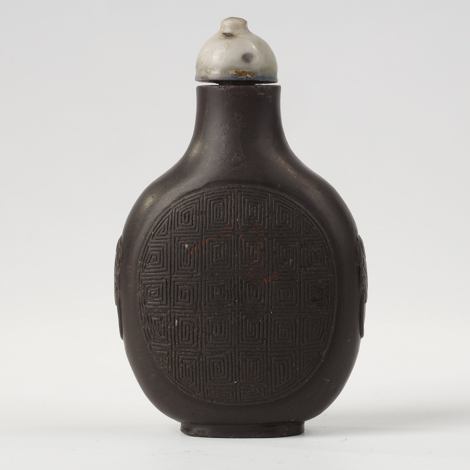 snuff bottle in duanstone slightly decorated in relief masks with shoulders -China 1780/1850