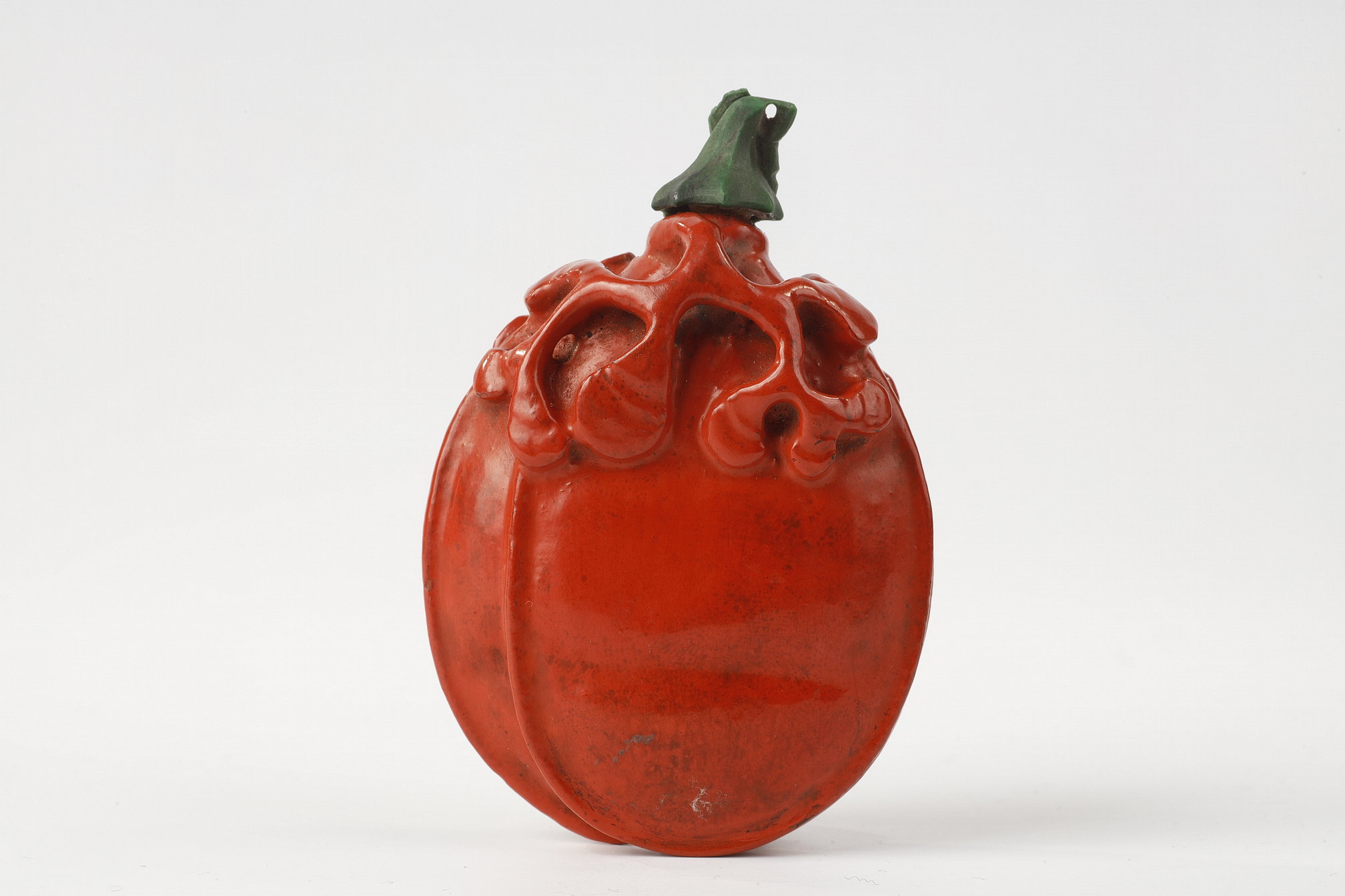 Red lacquered bamboo snuff bottle in the shape of a pod and its foliage China 19th century