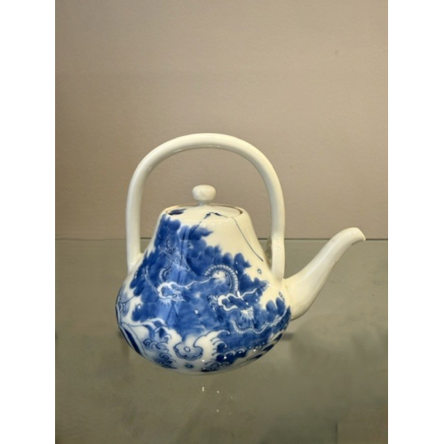 blue-white porcelain teapot decorated with a dragon and clouds from Hirado kilns Japan
Meiji period 1868/1912