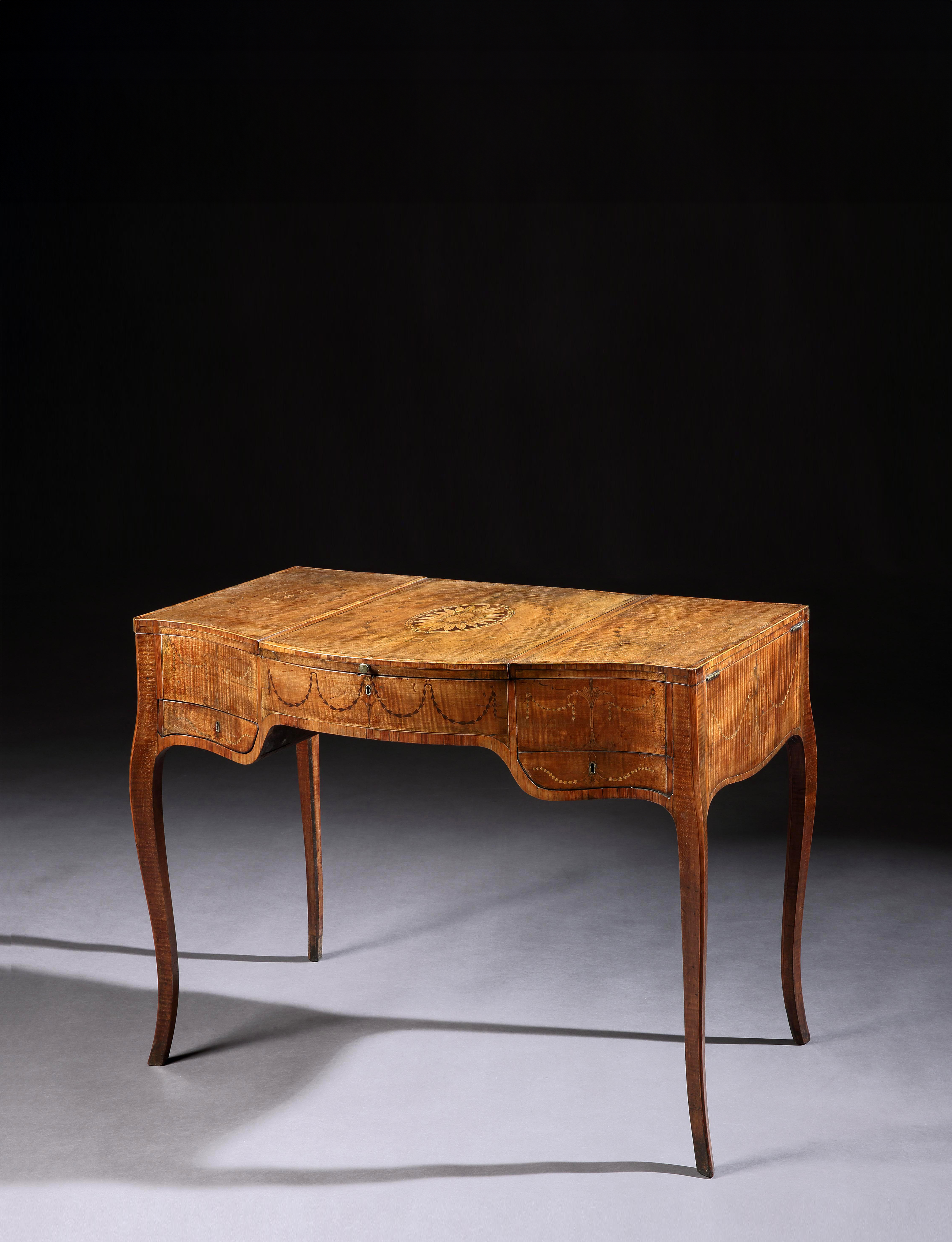 A George III Period Fiddleback Sycamore and Marquetry Dressing Table 

In the Manner of Mayhew and Ince

