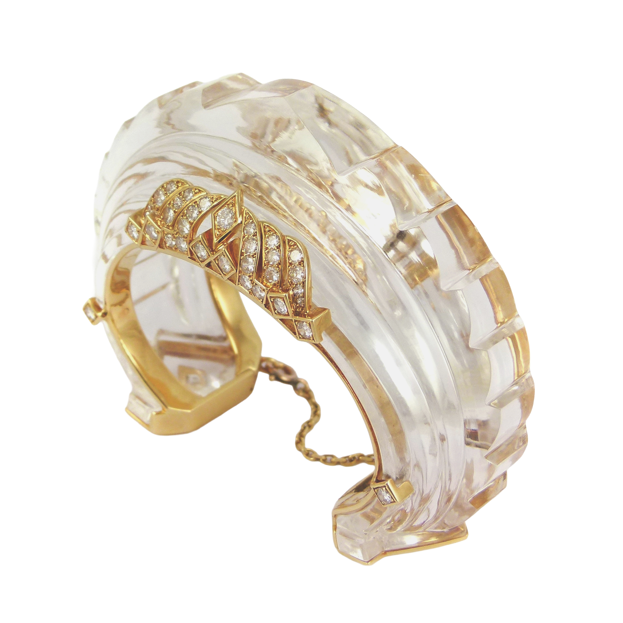 Carved rock crystal, diamond and gold architectural bangle by Cartier, Paris,