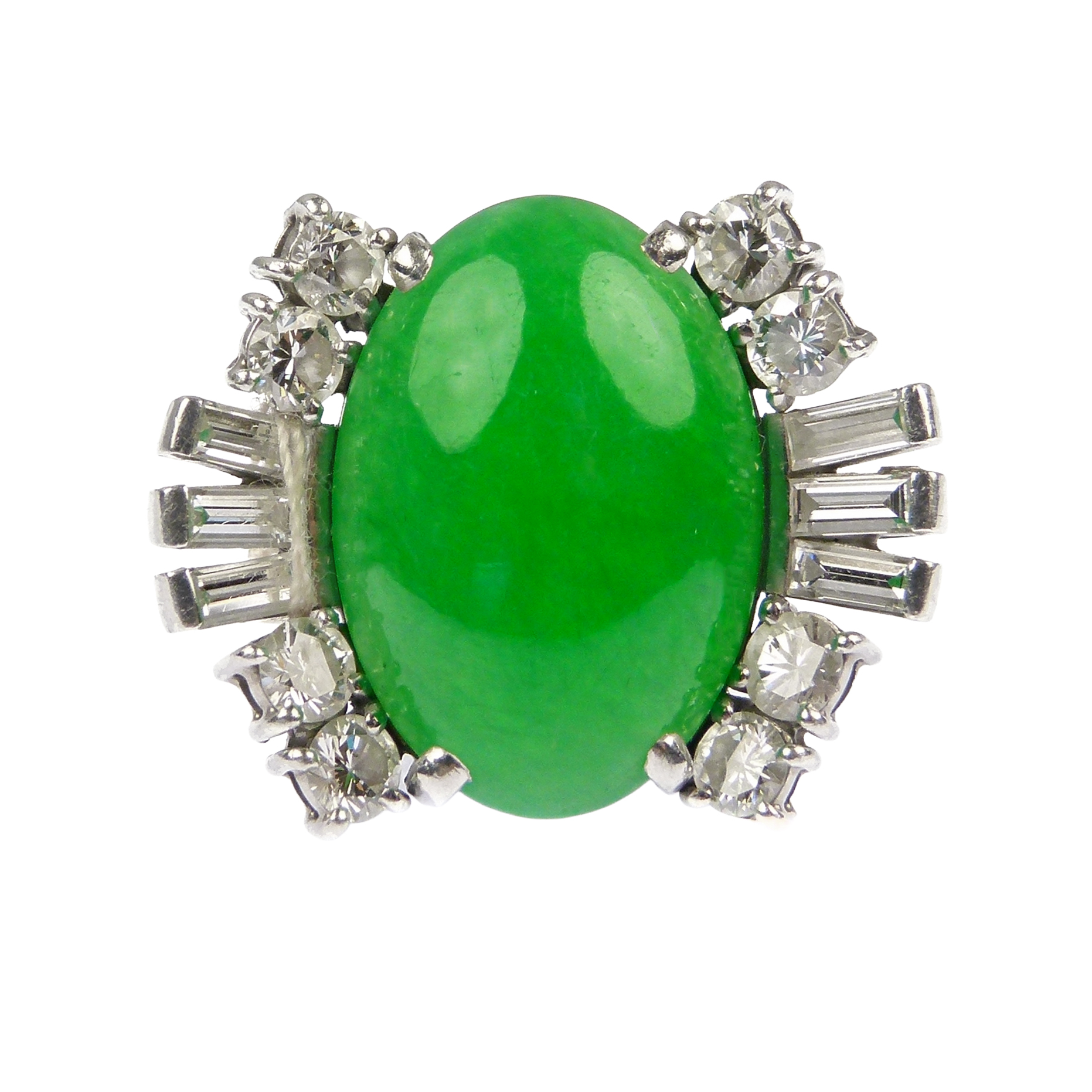 Single stone jade and diamond cluster ring, the oval jade between baguette diamond fans,