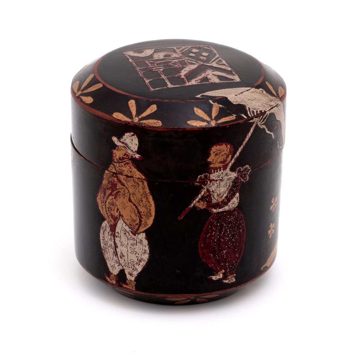 A Nanban box with three Portuguese figures