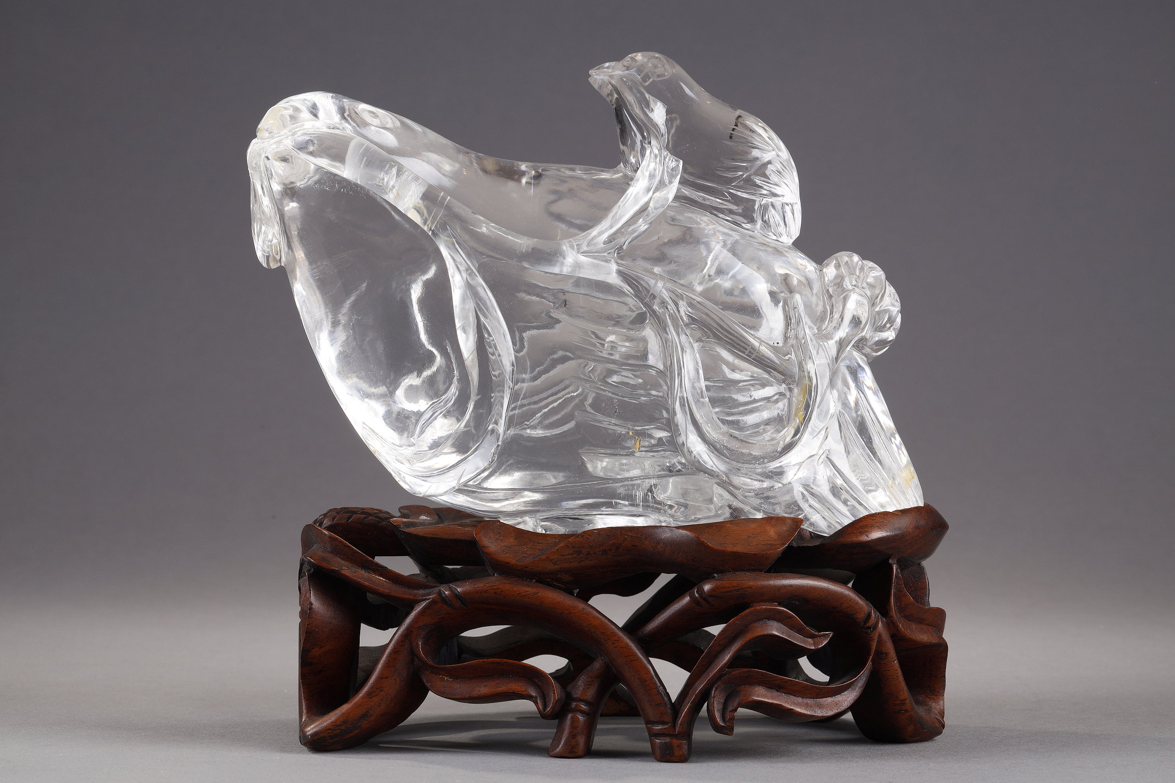 bird shaped rock crystal sculpture with its little one on the back ...