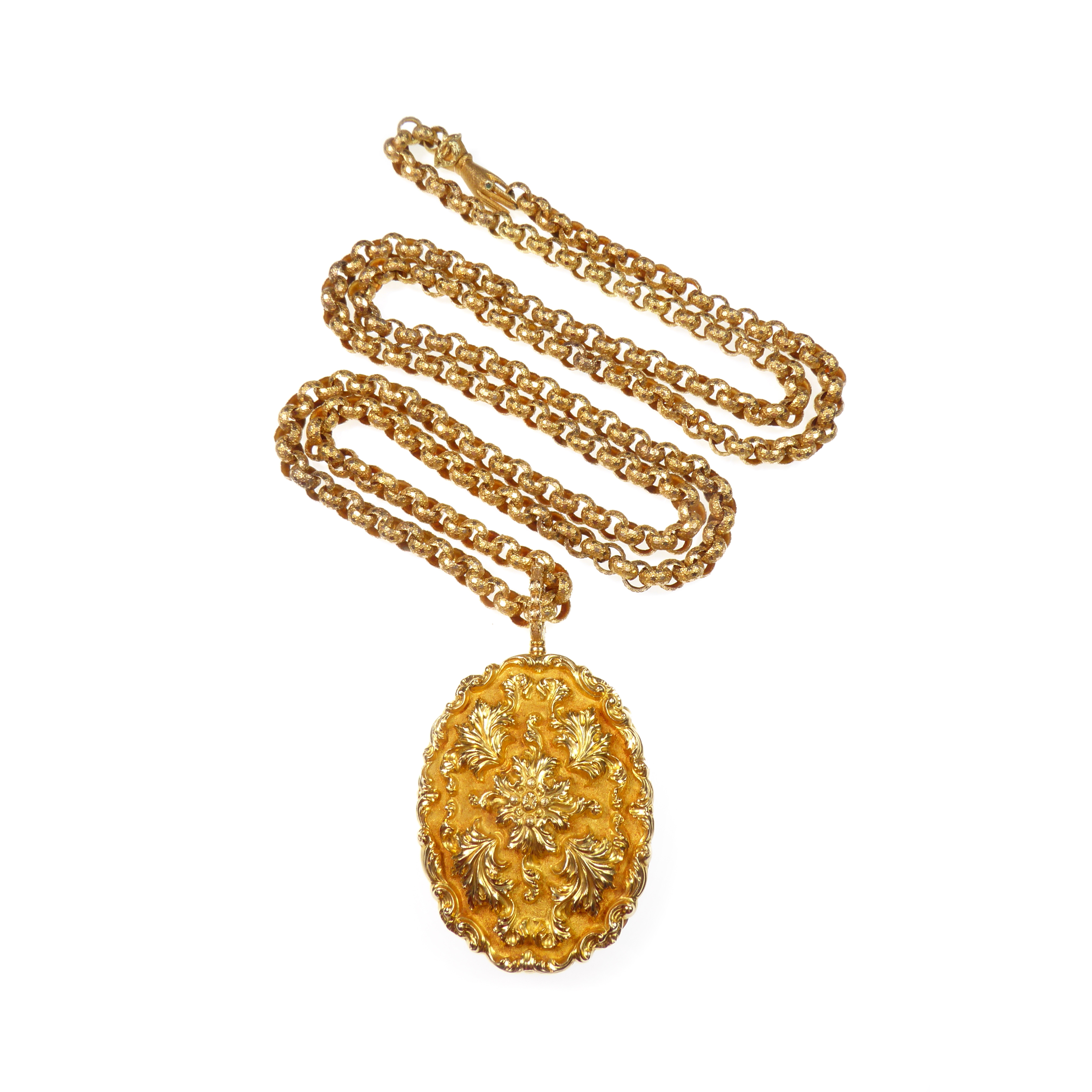 Antique gold double hinged locket on long gold chain, the large carved ...